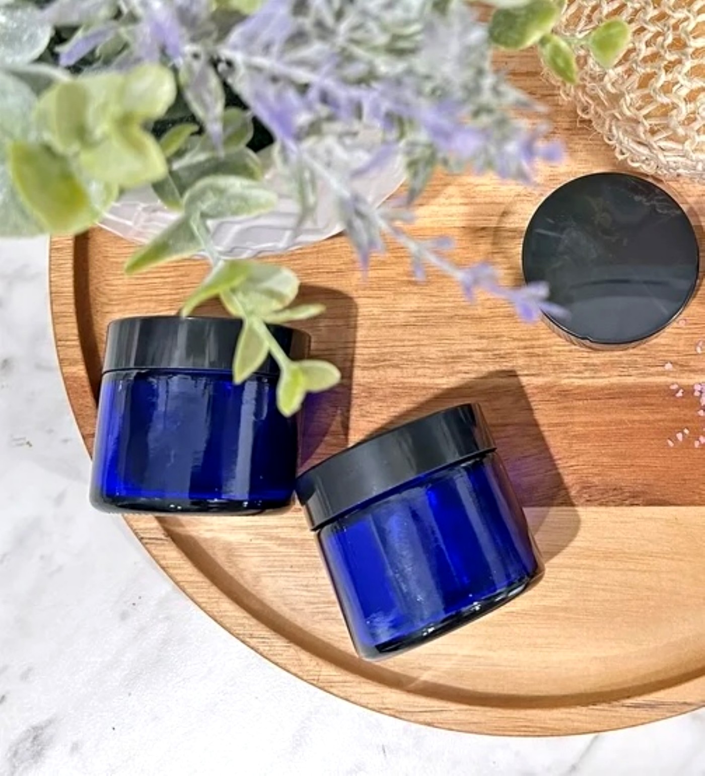 Ash & Eden Essentials pain relief salve jars with lavender
